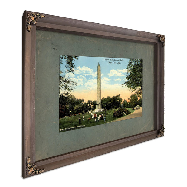Cleopatras Needle the Egyptian Enigma in the American Garden — Bourbon Framed Canvas Print | Bella Frye