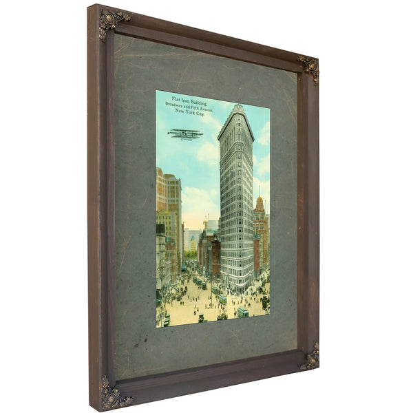 The Iron Sentinel Manhattans Wedge of Progress — Bourbon Framed Canvas Print | Bella Frye