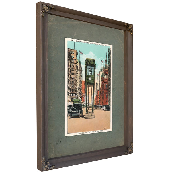 The Bronze Sentinel of Fifth Avenue — Bourbon Framed Canvas Print | Bella Frye