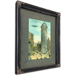 The Iron Sentinel Manhattans Wedge of Progress — Ebony Framed Canvas Print | Bella Frye