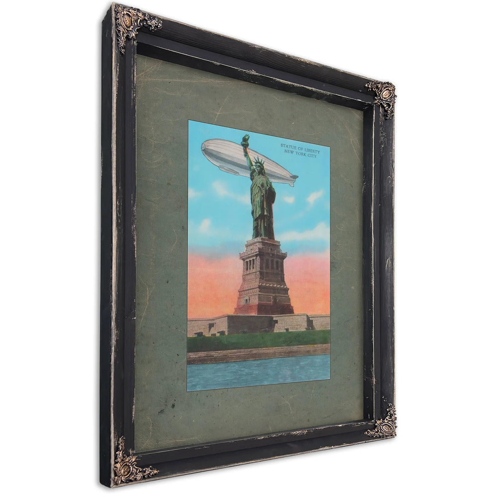 The Colossus and the Silver Leviathan Libertys Vigil at the Golden Door — Ebony Framed Canvas Print | Bella Frye