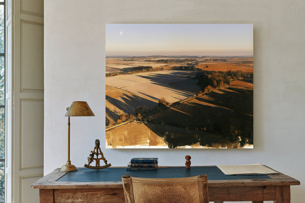 Aerial View Of Sunlit Farmland Fields by Bella Frye