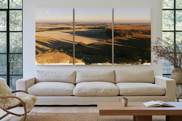 Aerial View Of Sunlit Farmland Fields by Bella Frye