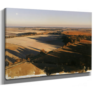 Aerial View Of Sunlit Farmland Fields by Bella Frye