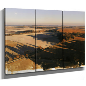 Aerial View Of Sunlit Farmland Fields by Bella Frye