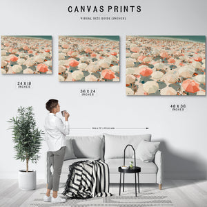 Crowded Summer Beach Aerial With Coral Umbrellas by Bella Frye