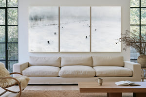 Figures Walking Across Snowy Winter Field by Bella Frye