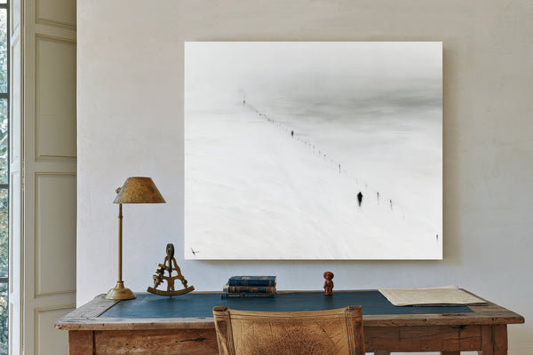 Figures Walking Snowy Slope In Fog by Bella Frye