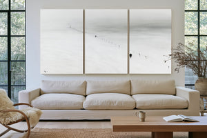 Figures Walking Snowy Slope In Fog by Bella Frye