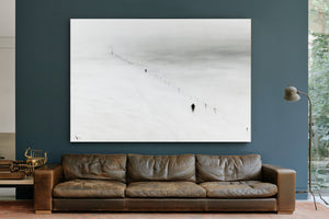 Figures Walking Snowy Slope In Fog by Bella Frye