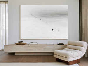 Figures Walking Snowy Slope In Fog by Bella Frye
