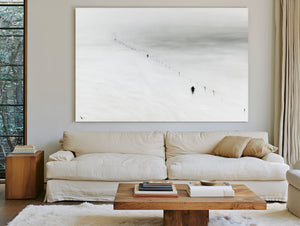 Figures Walking Snowy Slope In Fog by Bella Frye