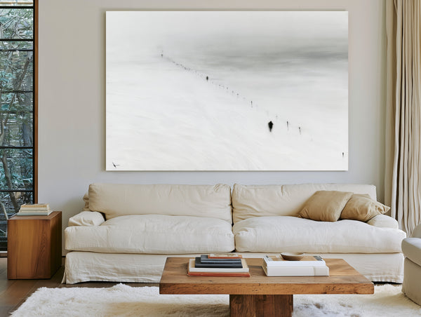 Figures Walking Snowy Slope In Fog by Bella Frye