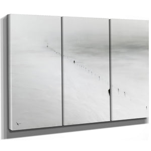 Figures Walking Snowy Slope In Fog by Bella Frye