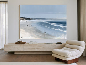 Figures Walking Wide Beach On Overcast Day by Bella Frye