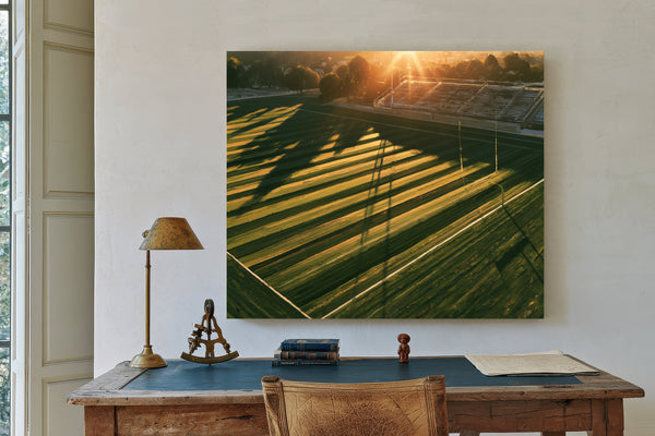 Football Field At Golden Hour Aerial View by Bella Frye