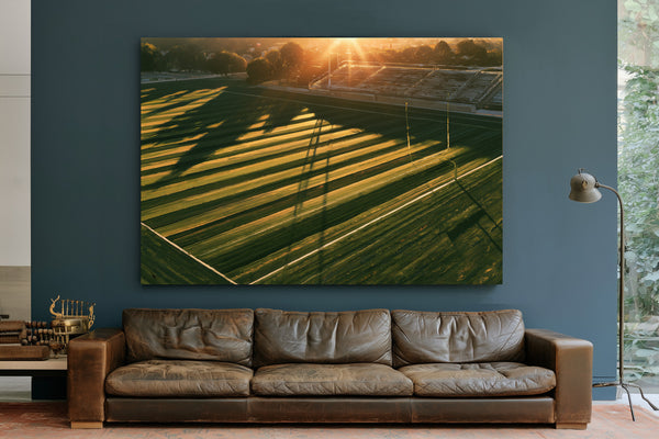 Football Field At Golden Hour Aerial View by Bella Frye