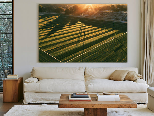 Football Field At Golden Hour Aerial View by Bella Frye