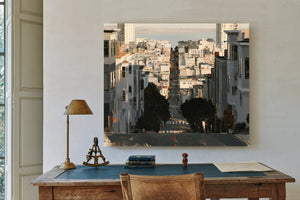 Steep City Street Descending Toward Bay by Bella Frye