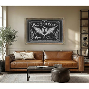 Bat Shit Crazy Social Club Sign Halloween wall art in a styled room