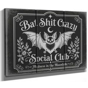 Bat Shit Crazy Social Club Sign Halloween wall art in a styled room
