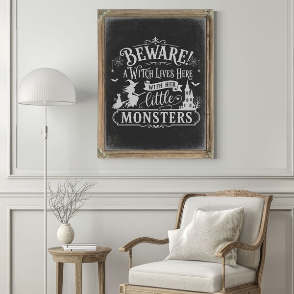 Beware A Witch Lives Here Sign Halloween wall art in a styled room