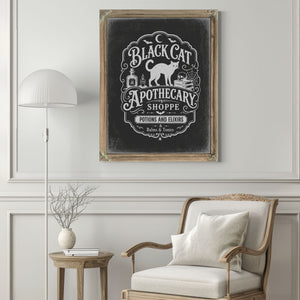 Black Cat Apothecary Shoppe Sign Halloween wall art in a styled room