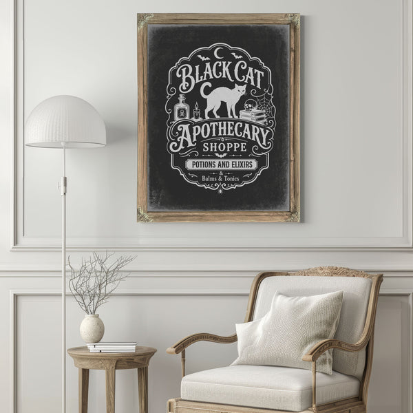 Black Cat Apothecary Shoppe Sign Halloween wall art in a styled room