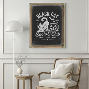 Black Cat Social Club Sign Halloween wall art in a styled room