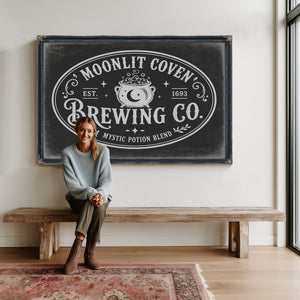 Witches Brewing Co Sign Halloween wall art in a styled room