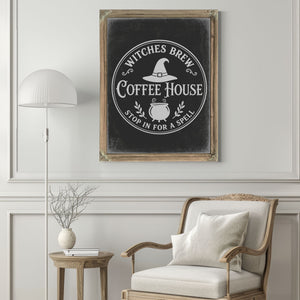 Haunted Coffee House Sign Halloween wall art in a styled room