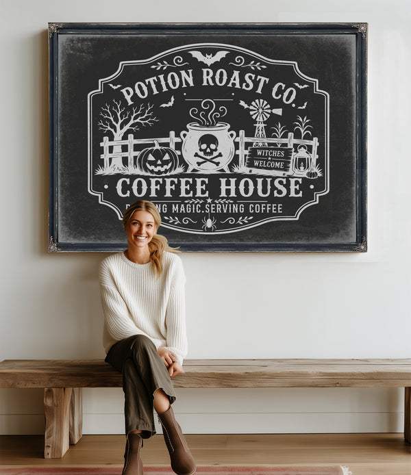 Haunted Coffee House Sign Halloween wall art in a styled room