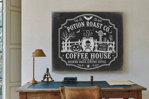 Haunted Coffee House Sign Halloween wall art in a styled room