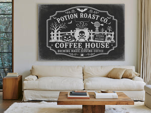 Haunted Coffee House Sign Halloween wall art in a styled room
