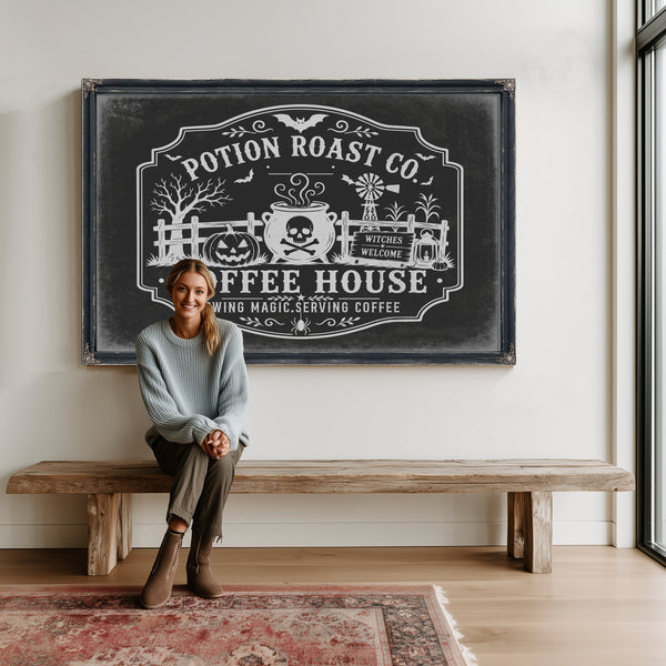 Haunted Coffee House Sign Halloween wall art in a styled room