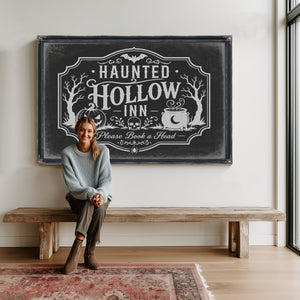 Haunted Hollow Inn Sign Halloween wall art in a styled room