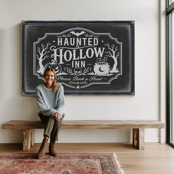 Haunted Hollow Inn Sign Halloween wall art in a styled room