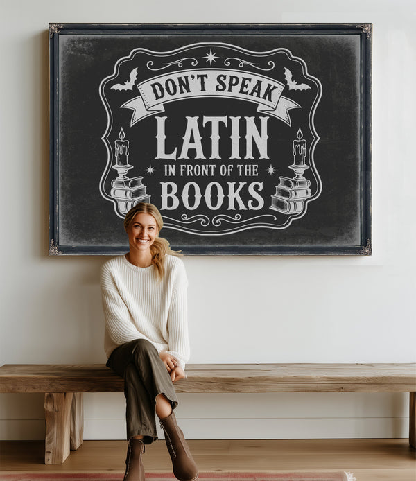 Latin Spell Books Sign Halloween wall art in a styled room