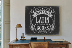 Latin Spell Books Sign Halloween wall art in a styled room