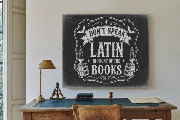 Latin Spell Books Sign Halloween wall art in a styled room