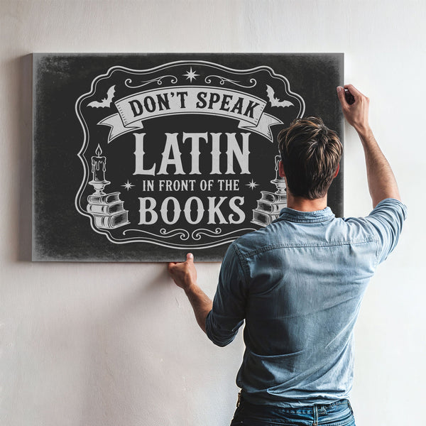 Latin Spell Books Sign Halloween wall art in a styled room