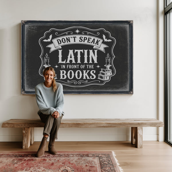 Latin Spell Books Sign Halloween wall art in a styled room
