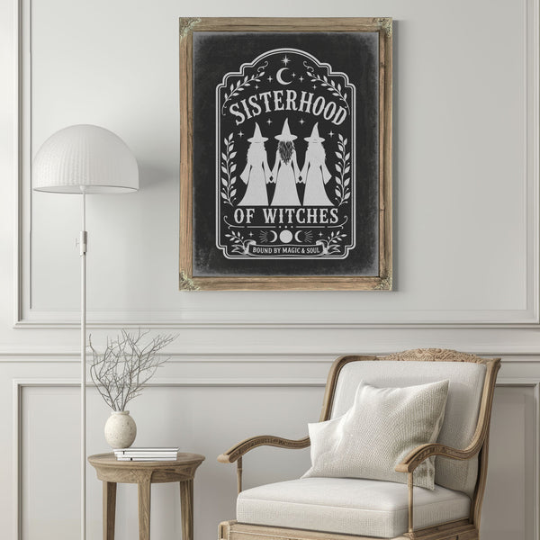 Sisterhood of Witches Sign Halloween wall art in a styled room