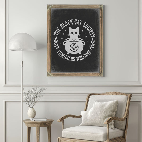 The Black Cat Society Sign Halloween wall art in a styled room
