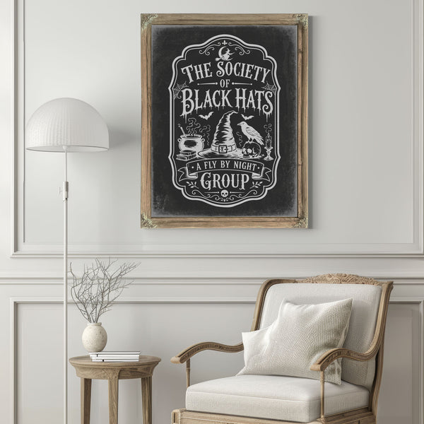 The Society of Black Cats Sign Halloween wall art in a styled room