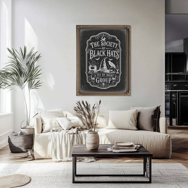The Society of Black Cats Sign Halloween wall art in a styled room