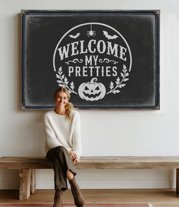 Welcome My Pretties Sign Halloween wall art in a styled room