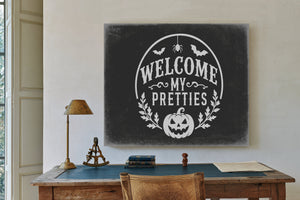 Welcome My Pretties Sign Halloween wall art in a styled room