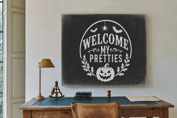 Welcome My Pretties Sign Halloween wall art in a styled room