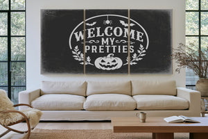 Welcome My Pretties Sign Halloween wall art in a styled room